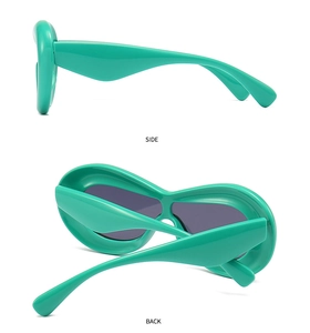 Side and back view of mint green chunky wrap-around sunglasses with puffed frames