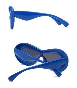 Futuristic wraparound sunglasses in bright blue with side and back view display