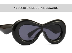 Detailed 45-degree side view of glossy black futuristic wraparound oversized sunglasses