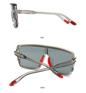 Side and back view of grey oversized sports sunglasses with red rubber nose pads