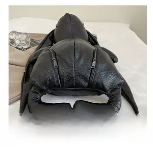 Detail shot of the durable wear-resistant bottom on the black rabbit shaped backpack
