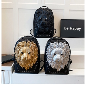 Three leather backpacks with 3D lion head relief and punk metal stud details