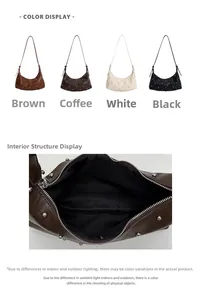 Detail view of crescent shoulder bag featuring silver rivets and a secure zipper interior