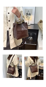 Detailed view of the dark brown croc-textured bucket bag with a stylish handle and strap