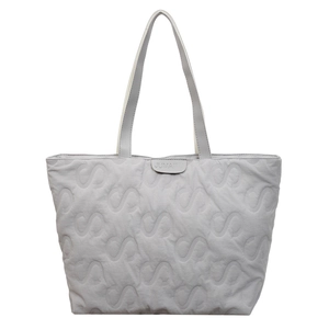 Grey quilted tote bag with S-shaped stitching and top handles for casual commuting