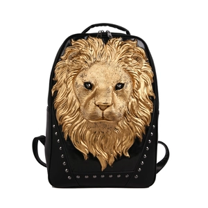 Minimalist black PU leather backpack featuring golden lion head relief and silver studs