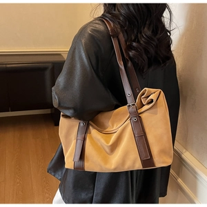 Winter large capacity camel suede tote bag showing practical shoulder wear on model