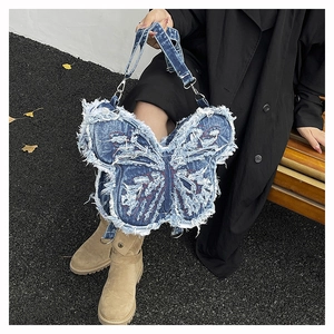 Y2K butterfly denim shoulder bag with fringe edges and red embroidery detail