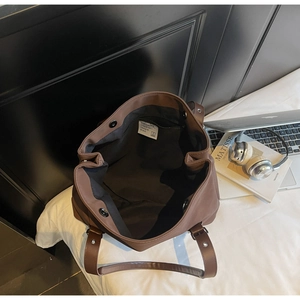 Interior view of large coffee tote bag showing spacious main compartment and inner pocket