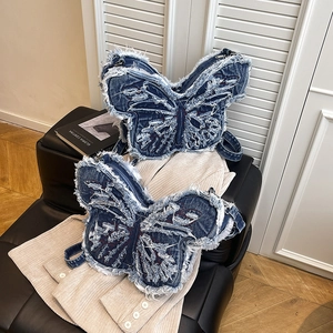 Retro Y2K denim butterfly shoulder bag with distressed fringe and embroidery detail