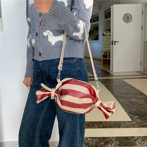 Creative candy-shaped crossbody bag with red and beige stripes in a sweet trendy style