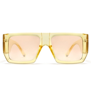 Front view of modern square sunglasses with transparent yellow frames and peach lenses