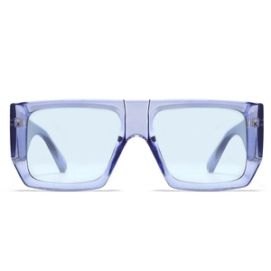 Close-up of translucent purple square frame sunglasses with metal hinge details