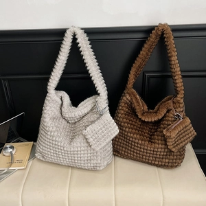 Soft plush tote bag with striped texture and small pouch in cream and brown colors