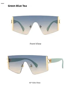 Detailansicht der Retro-Oversize-Sonnenbrille mit blau-tee Verlaufsgläsern und Goldakzenten