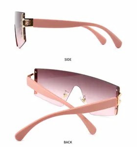 Seiten- und Rückansicht der rosa Farbverlauf-Schild-Sonnenbrille mit Goldakzenten