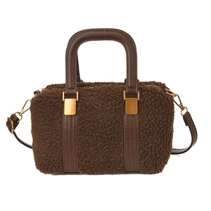Dark brown teddy plush Boston bag with leather handles and gold-tone hardware detail