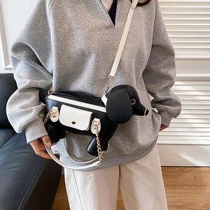 Chic black and white dachshund-shaped PU leather crossbody bag with gold chain and strap