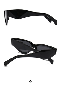 Side view of narrow cat-eye sunglasses with thick geometric temples in black