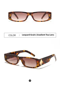 Detail of leopard grain sunglasses frames with gradient tea lenses and gold hardware