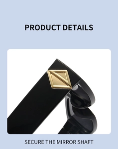 Detail of secure golden geometric triangle hinge on sleek black polished sunglasses frame