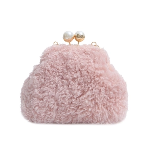 Pink plush faux lamb wool cloud handbag featuring gold metal clasp and pearl accents