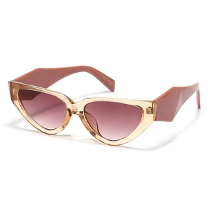 Narrow cat eye sunglasses with transparent tea frame and red gradient lenses for women