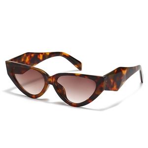 Narrow tortoise shell cat-eye sunglasses with brown gradient lenses for women