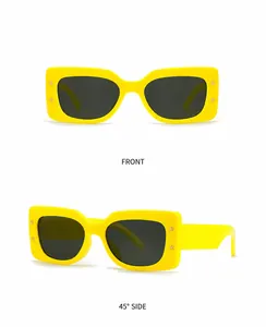 Front and 45-degree side view of yellow rectangle sunglasses with star rivet details