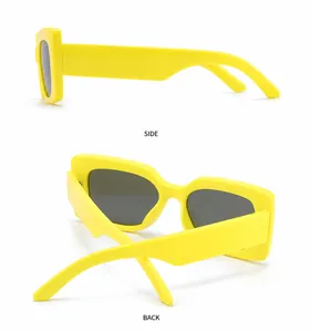 Detail view of bold yellow rectangular sunglasses showing side and back perspectives