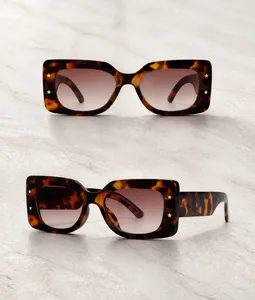Retro leopard print rectangle sunglasses featuring metallic star accents and tea lenses