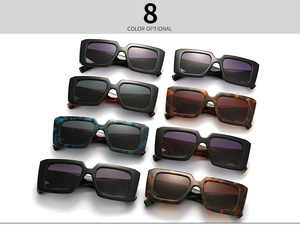 Flat lay display of vintage square sunglasses in eight different stylish color options