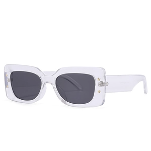 Modern polygonal transparent sunglasses with star studs and dark rectangle lenses