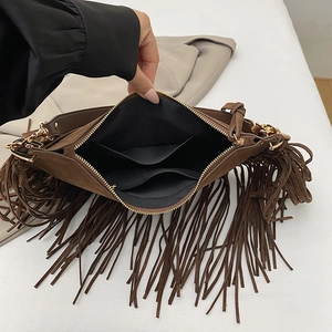 Bohemian brown suede fringe crossbody bag with large interior storage compartments