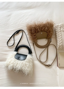 Close-up of fluffy faux wool bags in cream and brown with round PU handles and straps