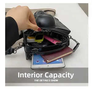 Internal capacity of the Gothic 3D skull crossbody bag showing storage for daily items