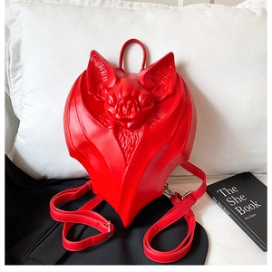 Detailed view of a red gothic 3D bat backpack made of premium synthetic leather texture