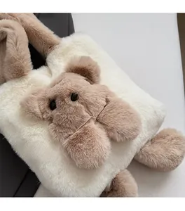Detailed close-up of fluffy white faux fur texture and brown plush bear on a tote bag