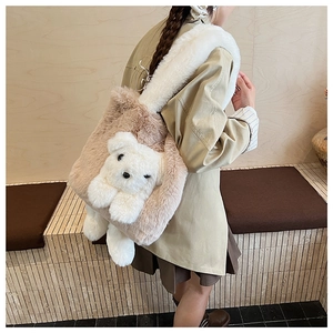 Detail view of a fluffy teddy bear plush tote bag showing the soft texture and thick strap