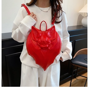 Detailed view of the red 3D bat backpack featuring gothic punk wings and realistic texture