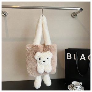 Close-up of brown plush bear tote bag with 3D white teddy details and soft handles