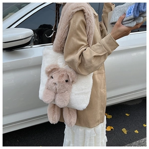 Detail view of a cute 3D teddy bear plush tote bag showing the soft faux fur texture