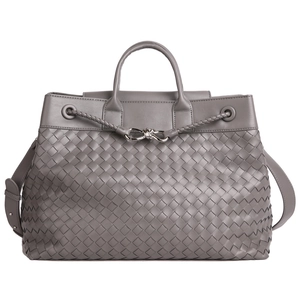 Dark grey woven leather handbag with signature knot detail and top handle in a sleek style