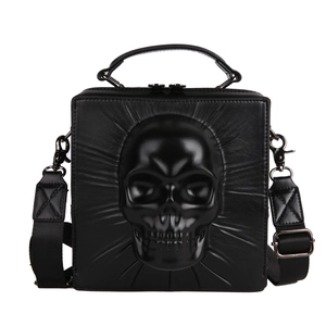 Gothic black square crossbody bag featuring 3D skull relief and wide shoulder strap