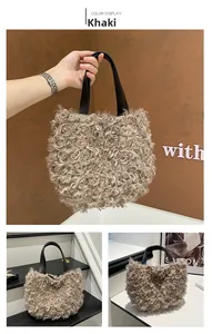 Detail of khaki plush tote bag featuring curly faux fur and black leather handles