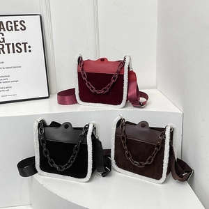 Fuzzy lamb wool patchwork crossbody bag with decorative chain in burgundy, black and brown
