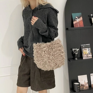 Beige faux fur tote bag with 3D rose texture and black leather handles for winter