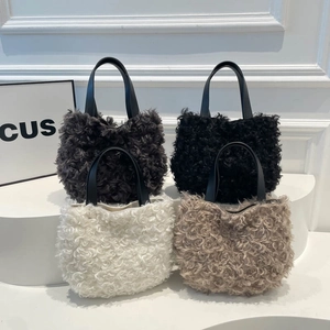 Fuzzy faux shearling tote bags in various colors with black leather handles for winter