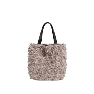 French vintage plush tote bag in taupe faux fur with black leather handles for winter