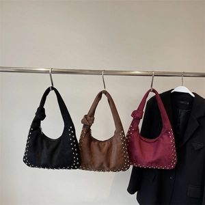 Retro suede hobo bags with metal rivets and knotted straps in three classic colors